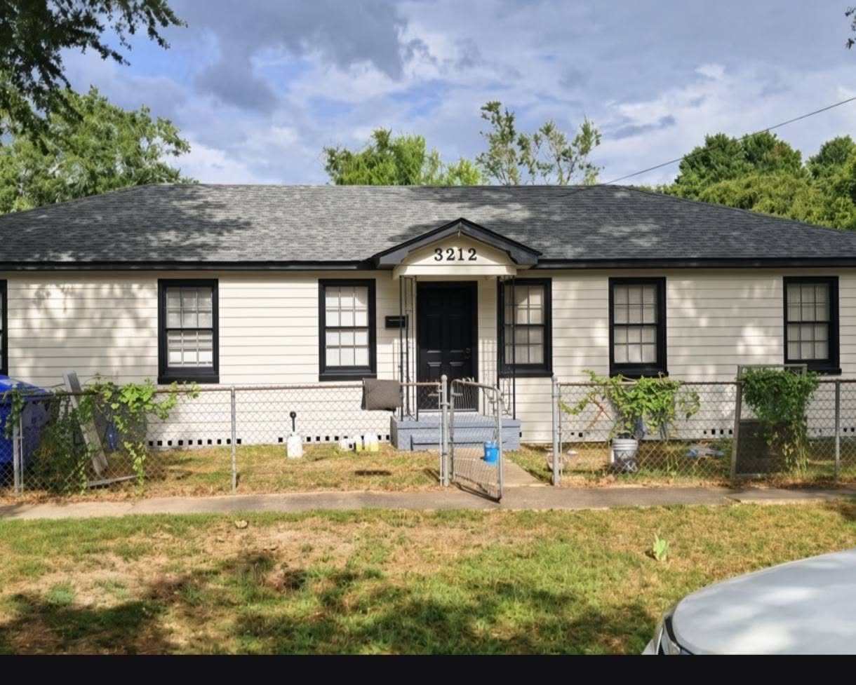 Ranch home with new gray shingle roof