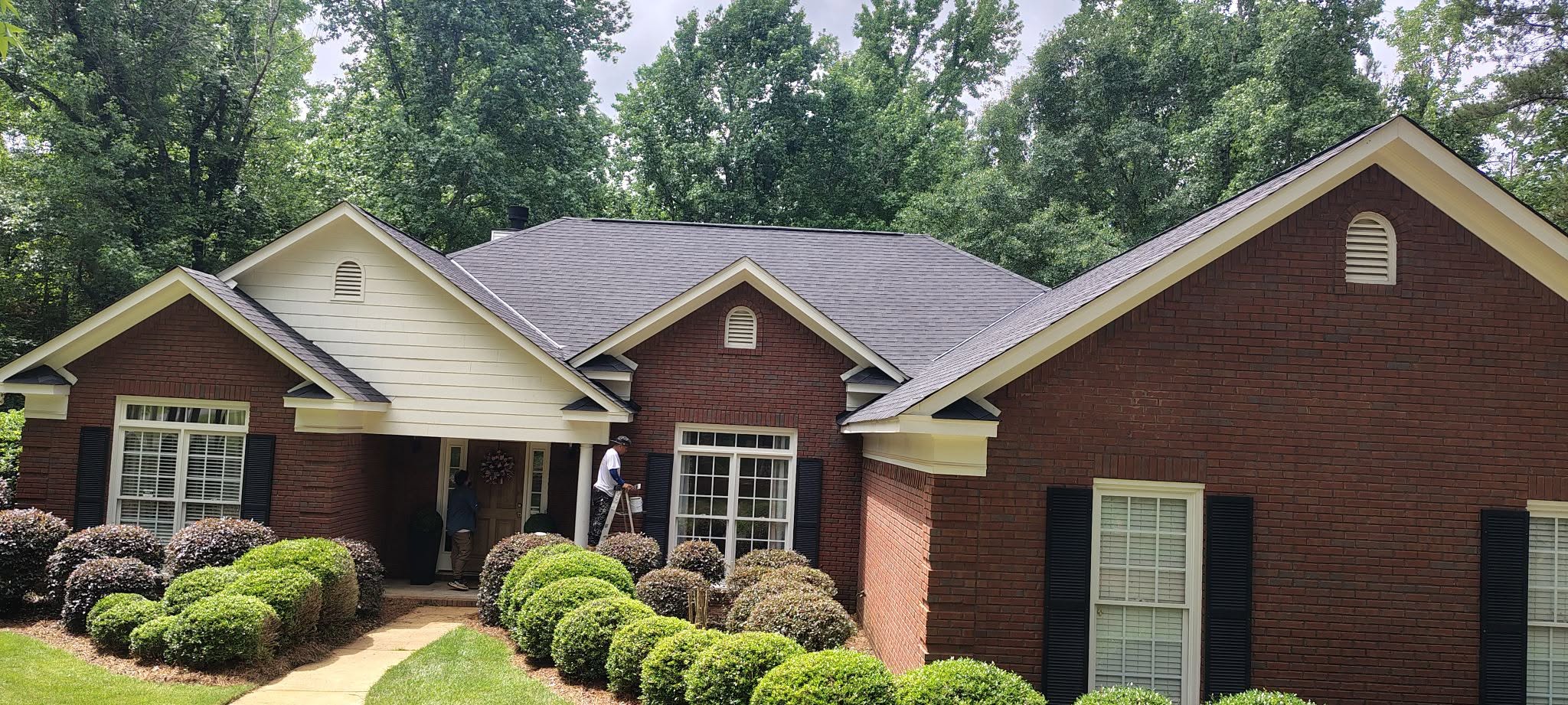 Brick ranch with Tamko rustic black architectural shingle roof
