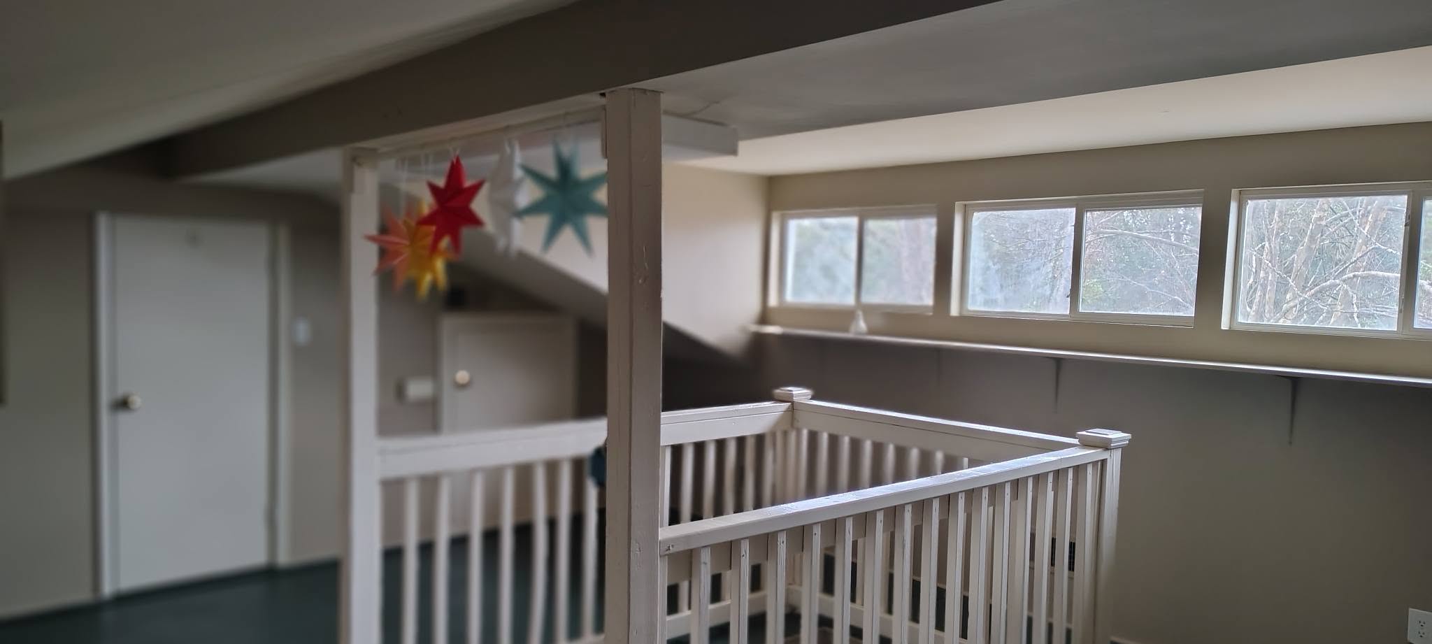 Stairwell with fresh paint and white railing