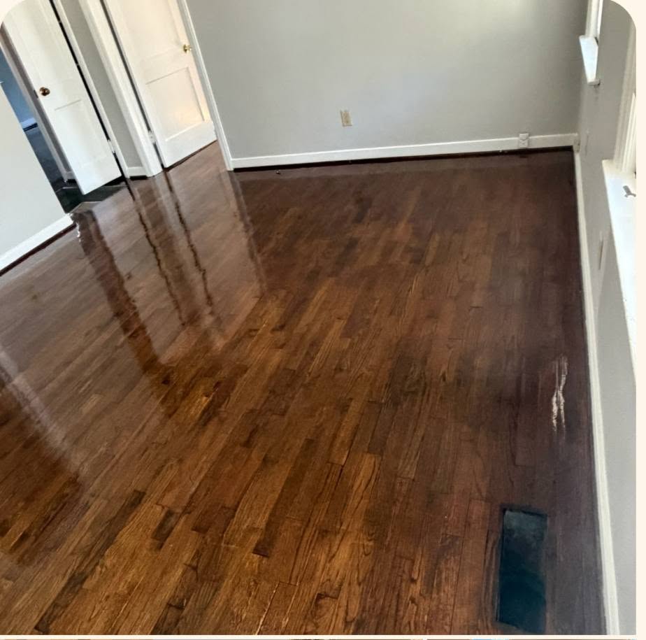 Freshly refinished glossy hardwood floors after